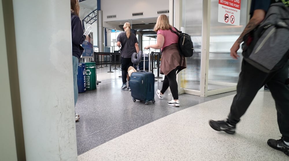 Travelers at CVG on Wednesday, May 7, 2025. BLAKE SHEELY/WCPO