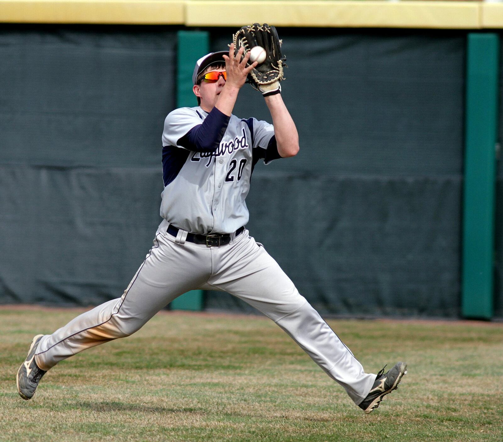Edgewood right fielder Matt Barger runs down a Badin fly ball during their Reds Futures Showcase at McKie Field at Hayden Park in Oxford on April 6, 2013. CONTRIBUTED PHOTO BY E.L. HUBBARD