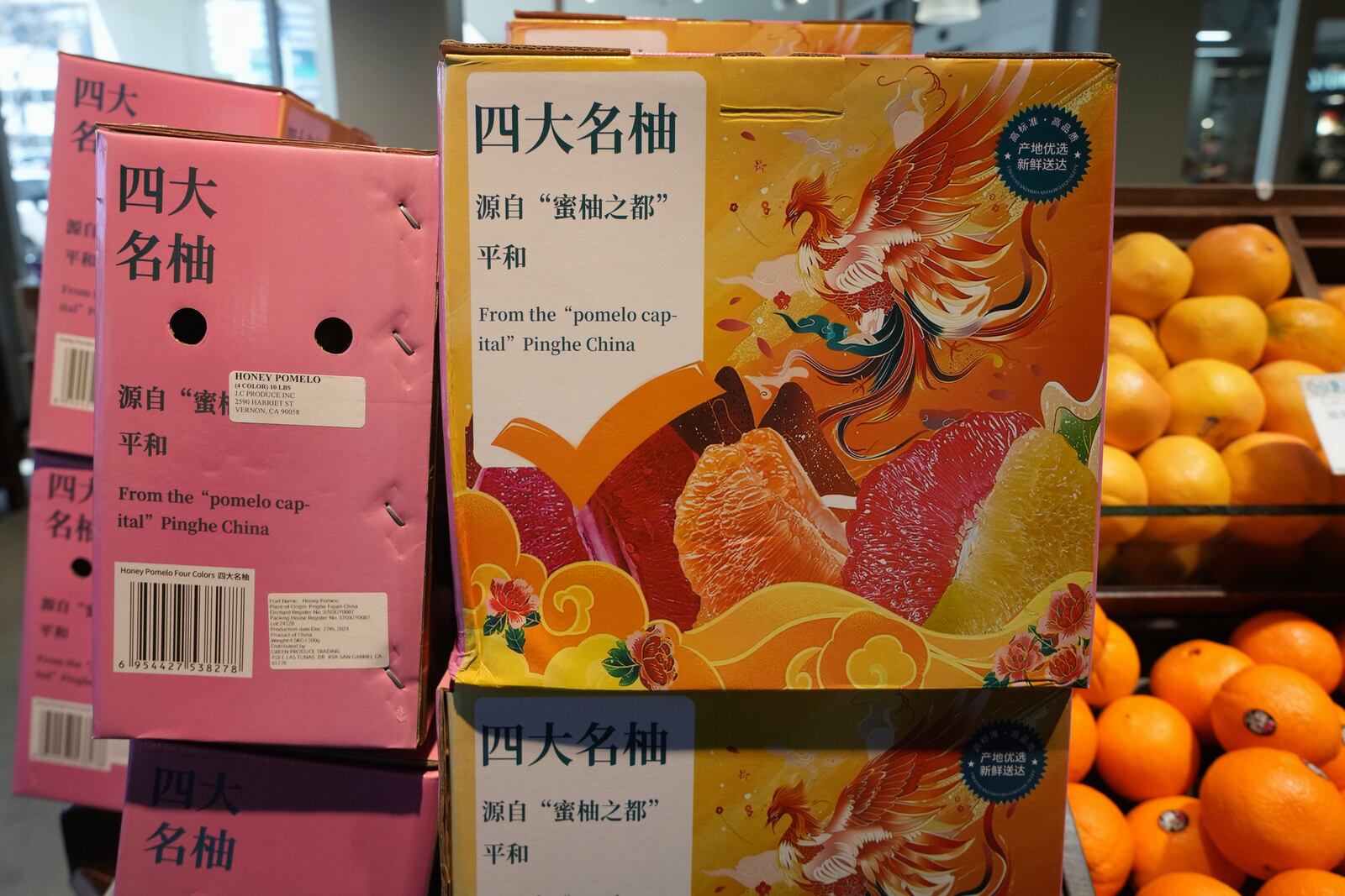 Pomelo citrus fruits imported from Pinghe County, China are sold at 99 Ranch Market, an Asian grocery store in Los Angeles Monday, April 7, 2025. (AP Photo/Damian Dovarganes)