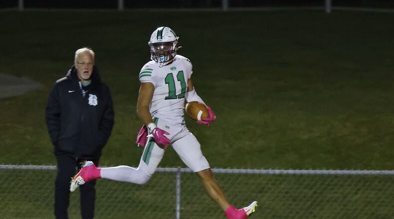 Badin's Braedyn Moore carries the ball for a touchdown. Badin defeated Fenwick 14-6 in their football game Friday, Oct. 14, 2022 at Bishop Fenwick High School. NICK GRAHAM/STAFF