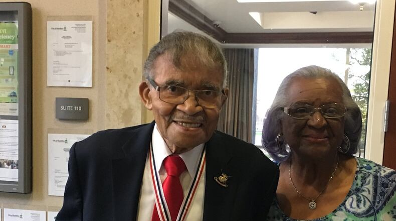 Hamilton native Robert Watson, with his wife of 69 years, Annacille (Robinson) Watson, has been recognized by Hamilton with an honorary street name on part of Second Street. Watson is a recipient of the Congressional Gold Medal for his military service. MIKE RUTLEDGE/STAFF