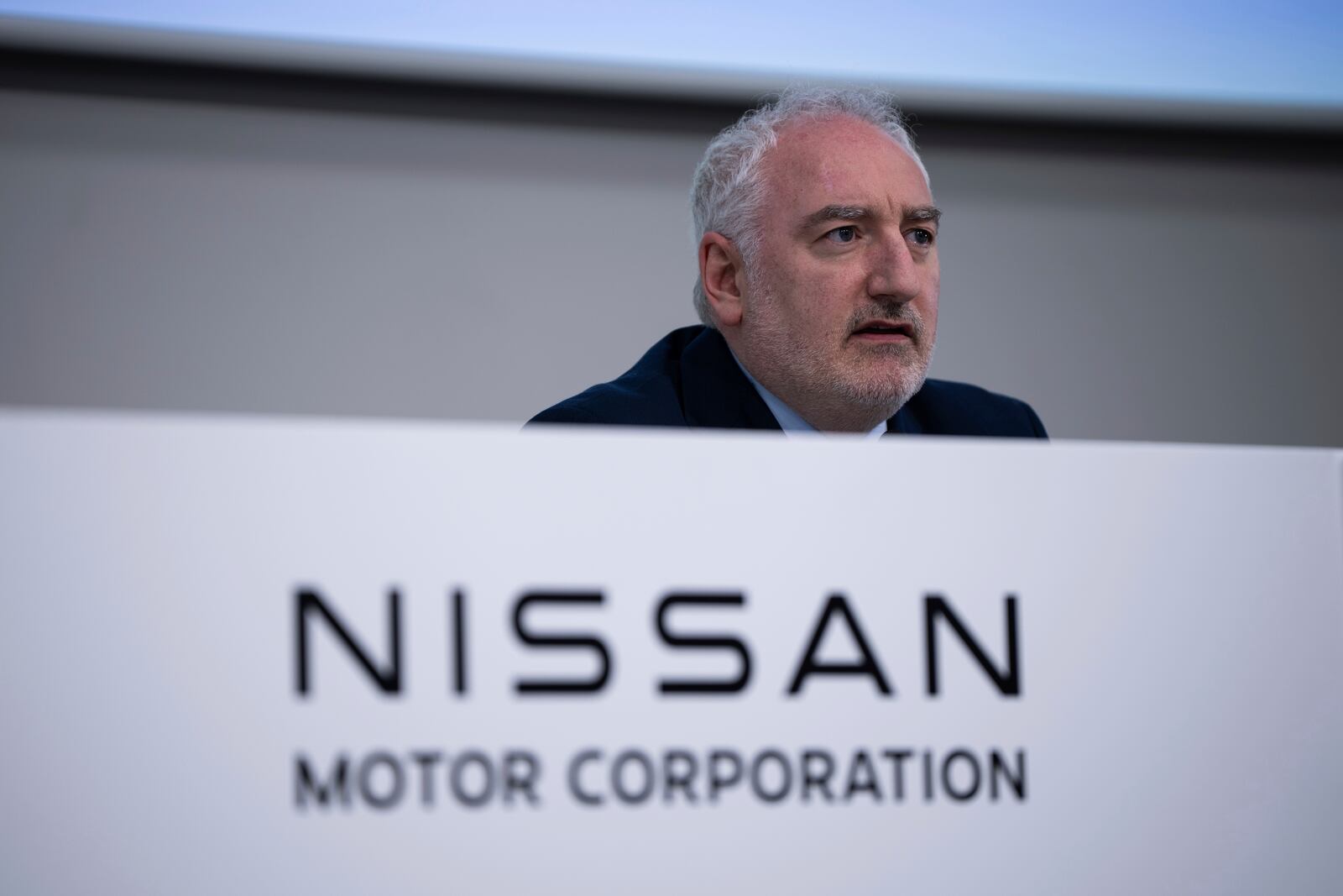 Nissan CFO Jeremie Papin attends a press conference to announce 2024 fiscal year financial results in Yokohama, Tuesday, May 13, 2025. (AP Photo/Louise Delmotte)