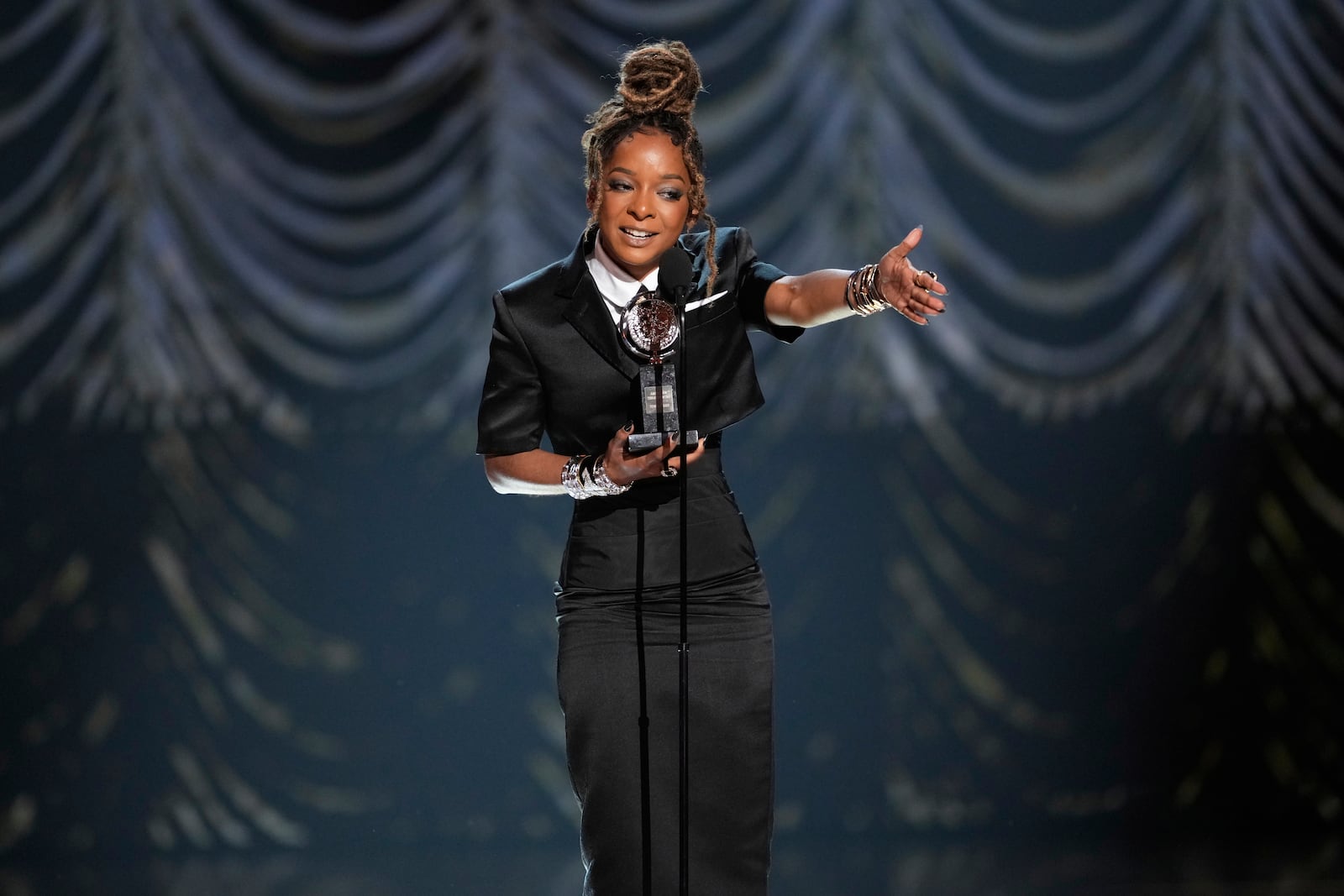 Kara Young accepts the award for best performance by an actress in a featured role in a play for "Purpose" during the 78th Tony Awards on Sunday, June 8, 2025, at Radio City Music Hall in New York. (Photo by Charles Sykes/Invision/AP)