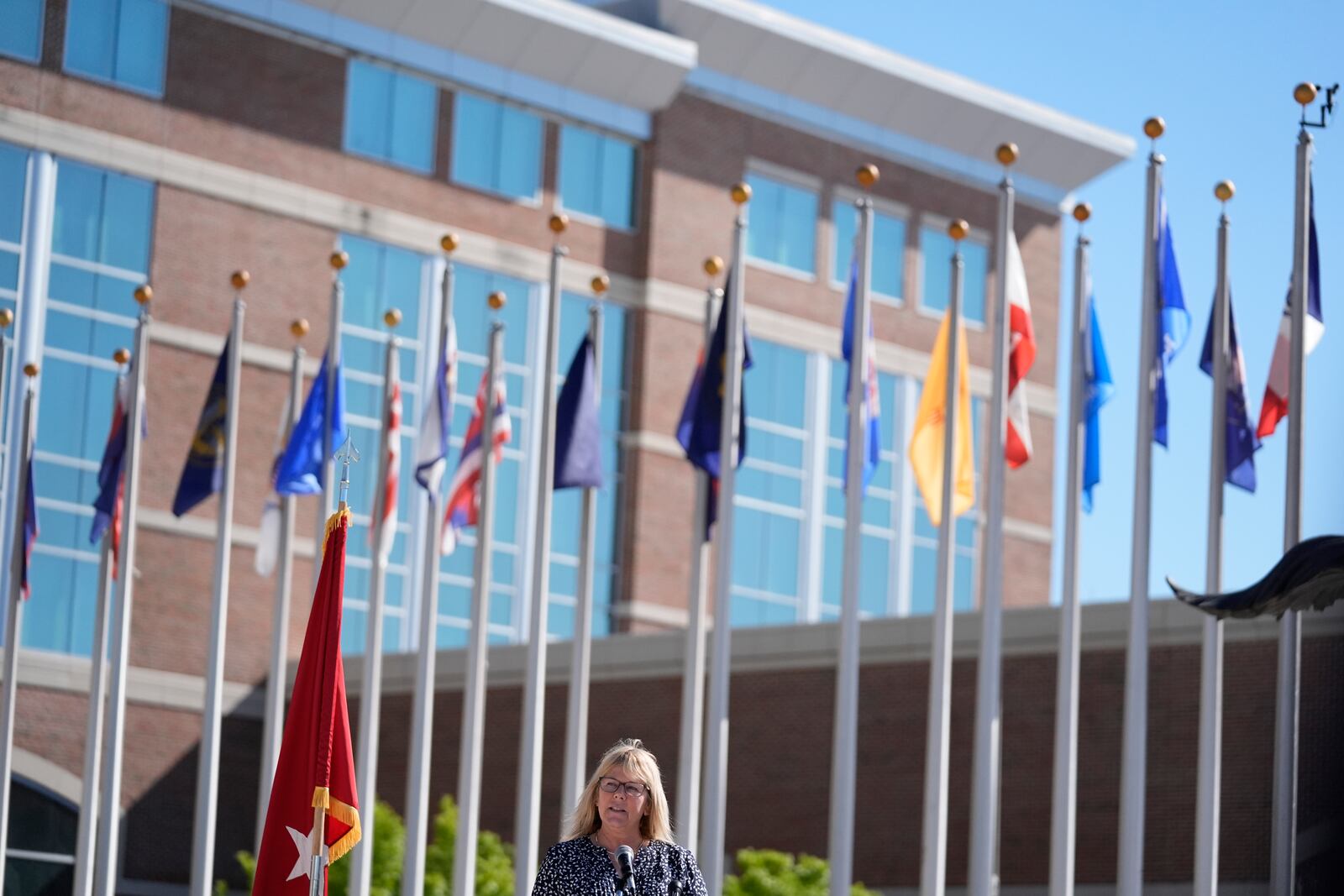 Ms. Sue Conger-Williams, Fred Benning's granddaughter, stands at Fort Benning during a ceremony honoring new namesake on Wednesday, April 16, 2025, in Fort Benning, Ga. (AP Photo/Brynn Anderson)
