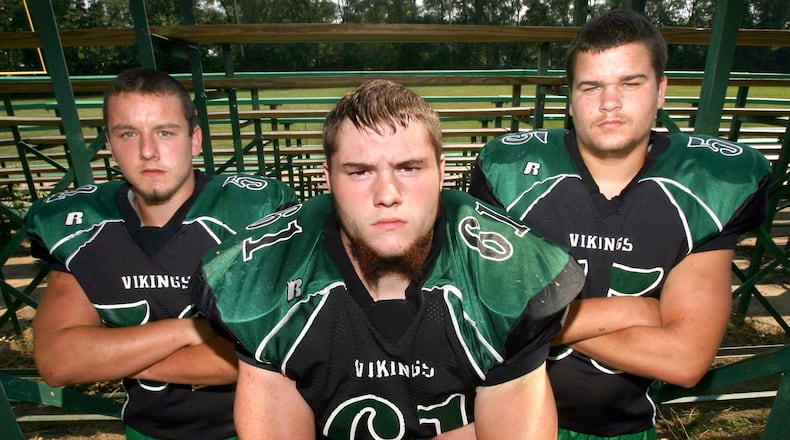 New Miami linemen (from left to right) Kris Roberts, Richie Hacker and Kenny Gabbard pose for a photo in 2008. GREG LYNCH/STAFF