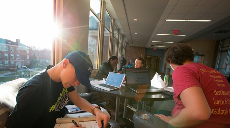 Earning national rankings in a variety of national academic measurements is nothing new to Miami University. But recently coming in second – right behind internationally acclaimed Massachusetts Institute of Technology (MIT) – was a welcomed surprise, say Miami officials. Pictured are students studying in Miami's Department of Computer Science and Software Engineering. Journal-News