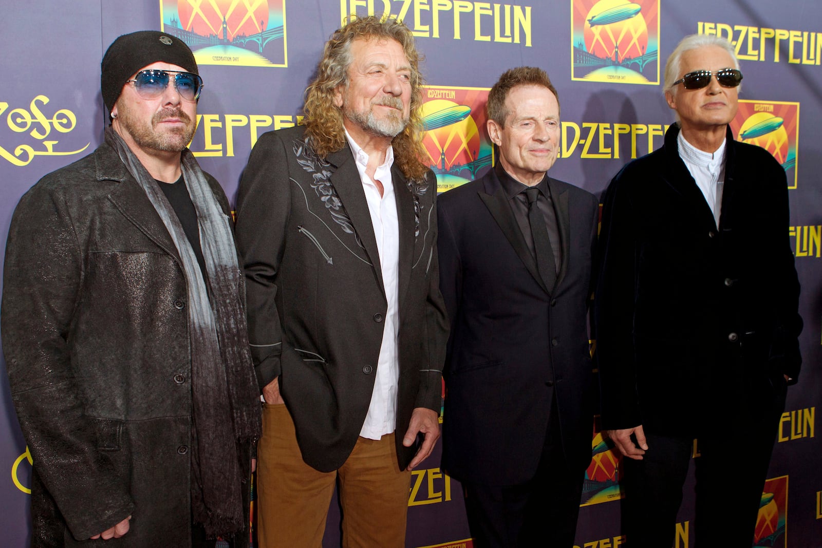 FILE - Jason Bonham, son of late Led Zeppelin drummer John Bonham;, from left, singer Robert Plant; bassist John Paul Jones; and guitarist Jimmy Page at the "Led Zeppelin: Celebration Day" premiere in New York on Oct. 9, 2012. (Photo by Dario Cantatore/Invision/AP, File)