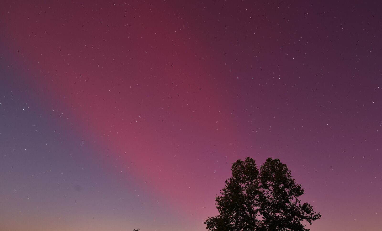 The Aurora Borealis, or northern lights, was visible from Ohio Thursday, Oct. 10, 2024. This was in Madison Township in Butler County. NICK GRAHAM/STAFF