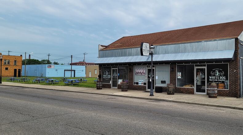The owners of the White Dog in downtown Middletown are proposing buying the vacant land next to their business and turning it into an outdoor entertainment venue with dog park. NICK GRAHAM/STAFF