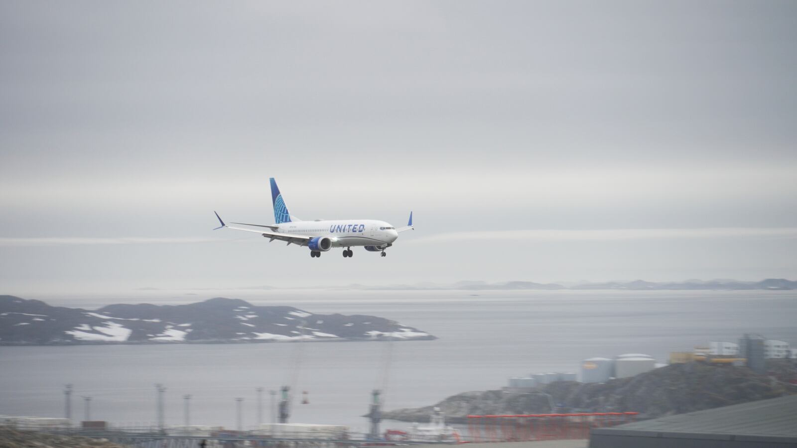 The first direct scheduled flight from Newark in the USA to Nuuk lands at the airport in Nuuk, Greenland, on Saturday, June 14, 2025. (AP Photo/Kwiyeon Ha)