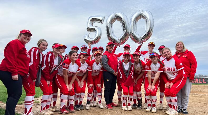Fairfield HIgh School's Brenda Stieger (center) became just the 20th softball coach in state history to reach 500 wins on Thursday when the Indians defeated Lakota East. Chris Vogt/CONTRIBUTED