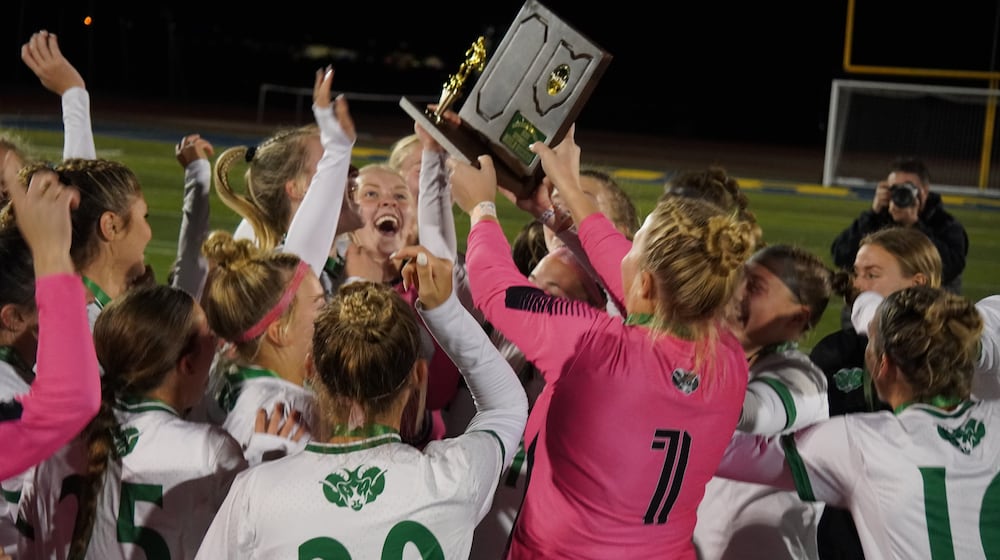 The Badin High School girls soccer team celebrates a Division III regional title following a 2-1 victory over Oakwood on Saturday at Monroe. CHRIS VOGT / CONTRIBUTED