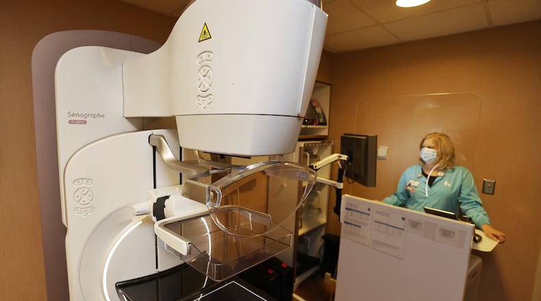 Kettering Health Hamilton's breast care center is seen here. Mammography coordinator Dawn Miller shows one of their two mammography rooms. NICK GRAHAM / STAFF