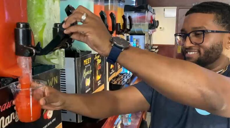 Ryan Gregory, a co-owner of The Frost on the Go with his brother Kei Gregory, pours a drink at the friends and family preview event on Thursday, May 11, 2023. Opening day is Friday, May 19, 2023. PROVIDED/TVHamilton