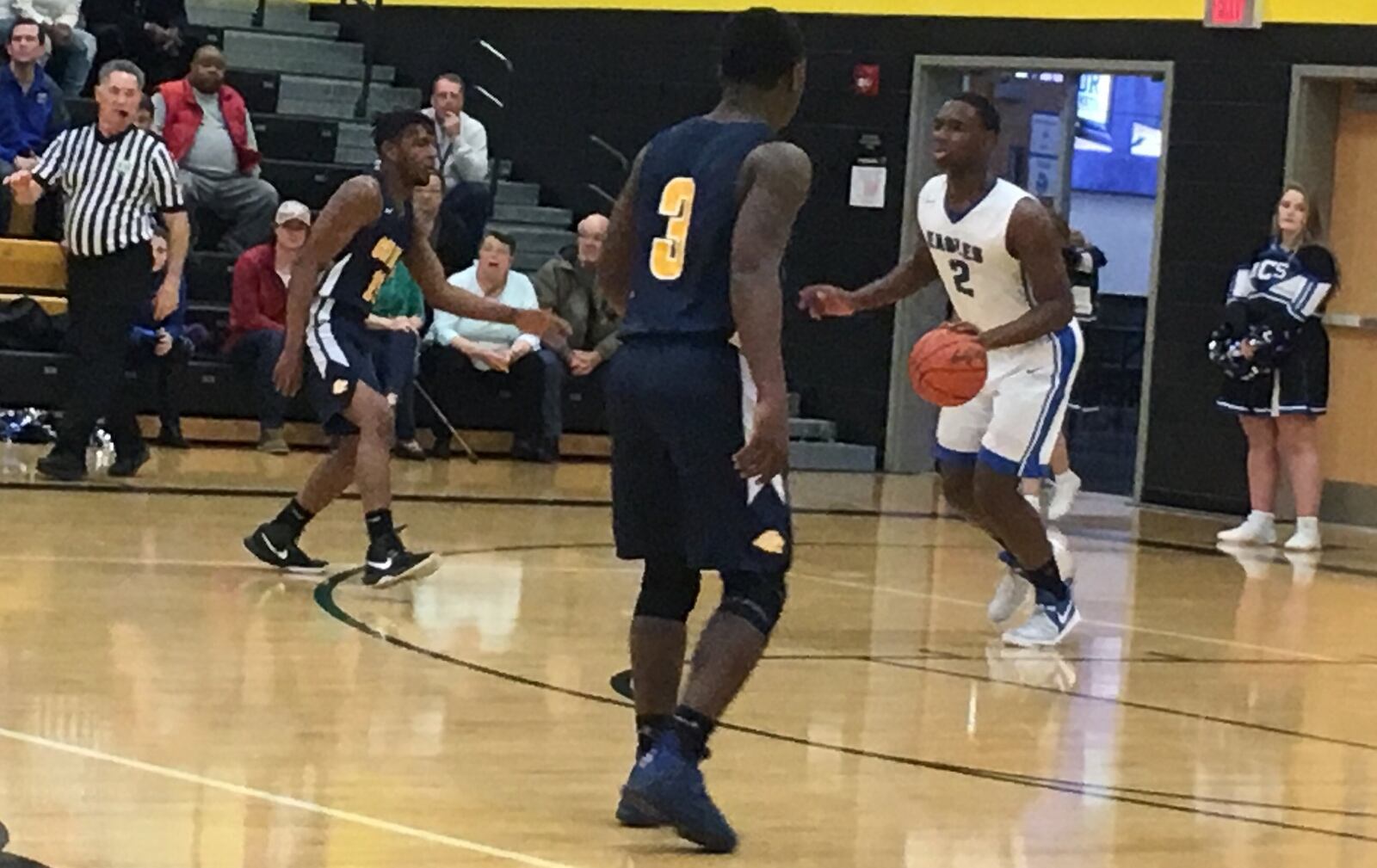 Middletown Christian’s Dre Shores (2) dribbles up the floor against Cincinnati College Prep Academy on Saturday night during a Division IV sectional final at Taylor. RICK CASSANO/STAFF
