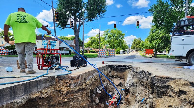 Millville avenue at Donna Avenue is closed for water main work with a large hole in the middle of the intersection Thursday, July 18, 2024 in Hamilton. NICK GRAHAM/STAFF