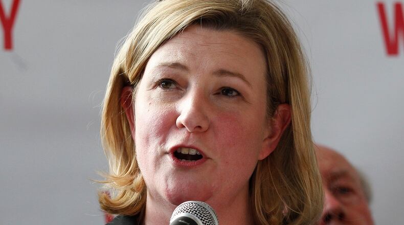 Dayton Mayor Nan Whaley, a Democrat, announces she is running for Ohio governor in front of a crowd of supporters at Warped Wing Brewery Monday, May 8, 2017. CHRIS STEWART / STAFF