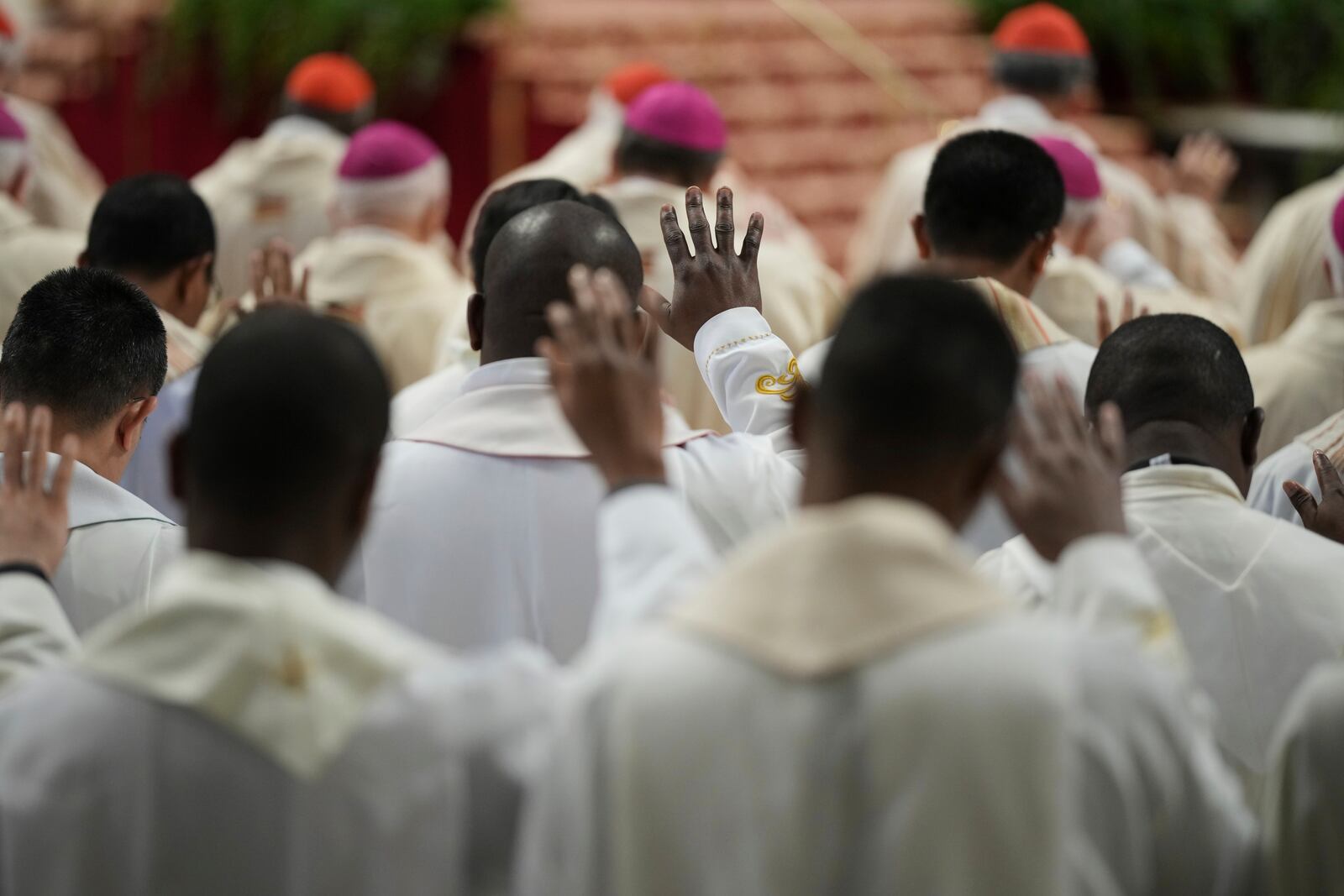 Cardinals attend the Chrism Mass on Ash presided by Delegate of the Holy Father, Cardinal Domenico Calcagno at the St. Peter's Basilica at The Vatican, Thursday, April. 17, 2022. (AP Photo/Andrew Medichini)