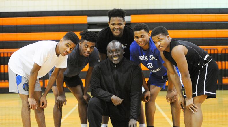 The Stivers High School boys basketball team has rallied around coach Felix Turner (Center). Taking a break from practice are Tigers starters Allen Lattimore (left), Da’juan Allen, Lorenzo Lewis, Trevon Ellis and Doug Spear on Wednesday, Jan. 2, 2019. MARC PENDLETON / STAFF