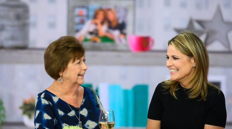 In this image provided by NBCUniversal, Savannah Guthrie, right, her mom Nancy speak, Wednesday, April 17, 2019, in New York. (Nathan Congleton/NBCUniversal via AP)
