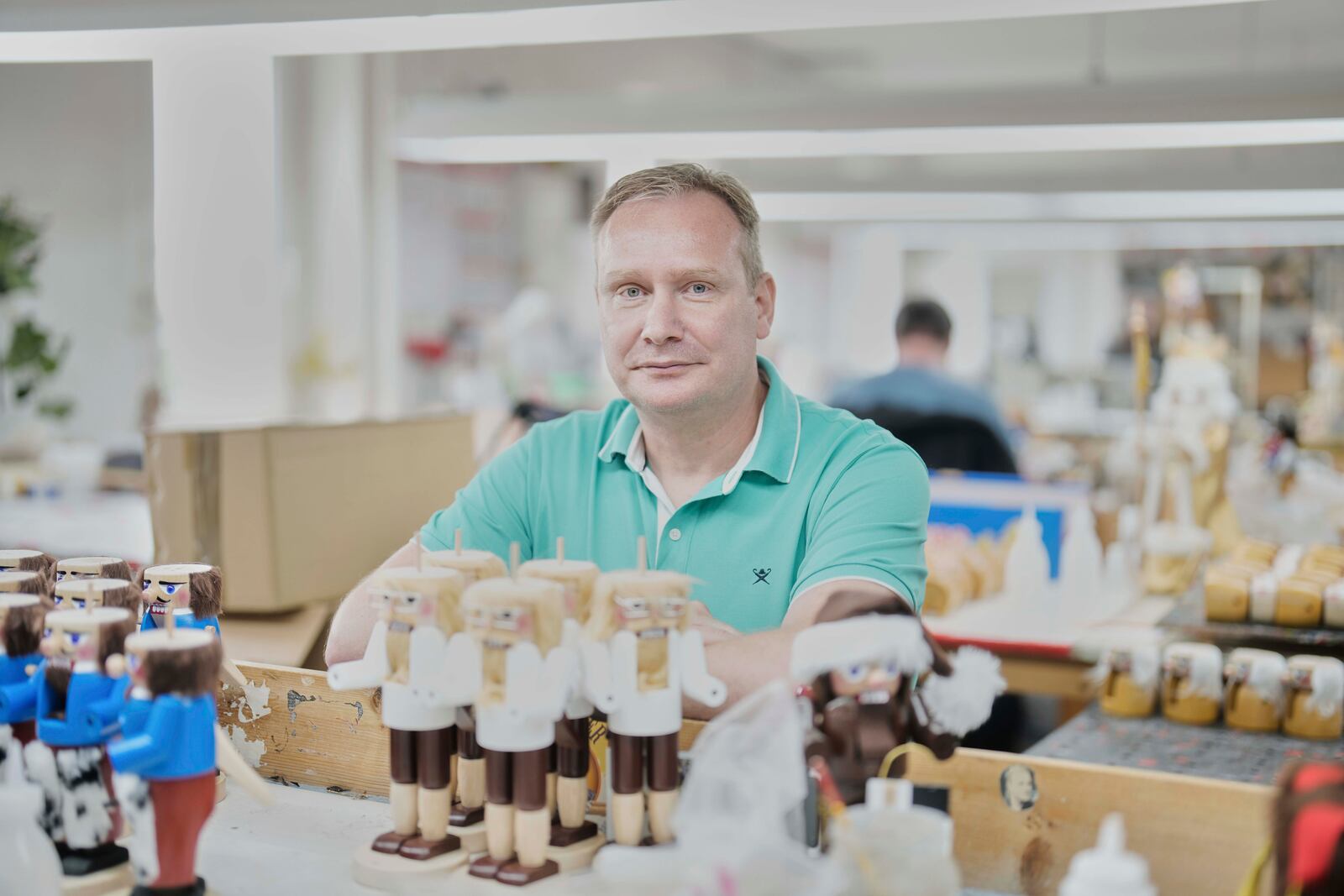 Rico Paul, manager and owner of the Steinbach-Volkskunst nutcracker factory, poses for a photograph inside his factory, in Marienberg, Germany, Tuesday, April 15, 2025. (AP Photo/Markus Schreiber)