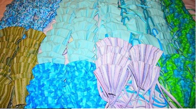 A group of 40 physicians and other volunteers who are part of the Islamic Center of Greater Cincinnati community recently stepped up with a group of volunteers to make nearly 400 covers for N95 masks to lengthen the time they can be safely used by healthcare workers. CONTRIBUTED