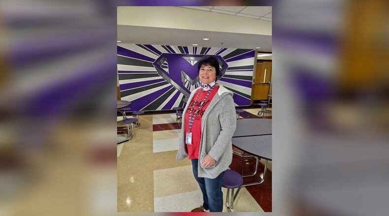 Amanda Elementary lead custodian Kim Deaton used her training from her former job as a EMT member to save a 5th-grade boy from choking to death on food in the school's cafeteria. Deaton responded quickly and is hailed as a hero for saving Cole Hanson Oliver. (Provided Photo\Journal-News)