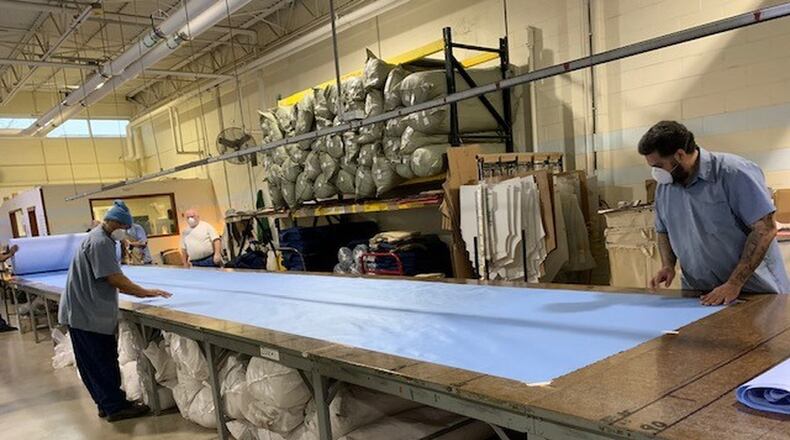 Inmates at Allen Oakwood Correctional Institution in Lima are sewing hospital gowns and masks for distribution to front line health care workers in the coronavirus outbreak. The Ohio Department of Rehabilitation and Correction said inmates will make gowns, masks, face shields and hand sanitizer. Contributed photo