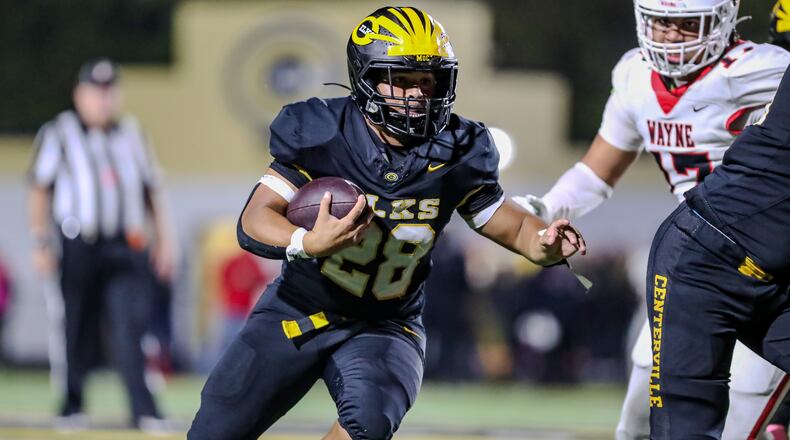 Centerville High School junior Parker Johnson runs the ball during their game against Wayne on Friday night at Centerville Stadium. Johnson scored three TDs as the Elks won 38-14. CONTRIBUTED PHOTO BY MICHAEL COOPER