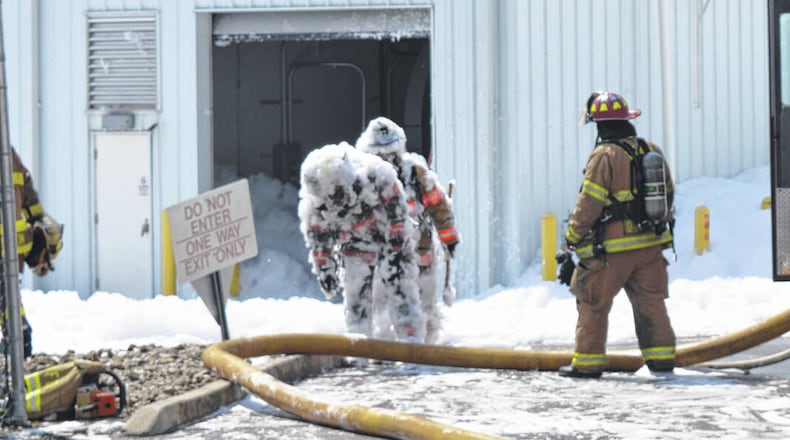Eight firefighters were injured while responding to a hangar at Wilmington Air Park that had filled with fire suppression foam. A man died in the incident that happened Aug. 7, 2022. TOM BARR/WILMINGTON NEWS JOURNAL