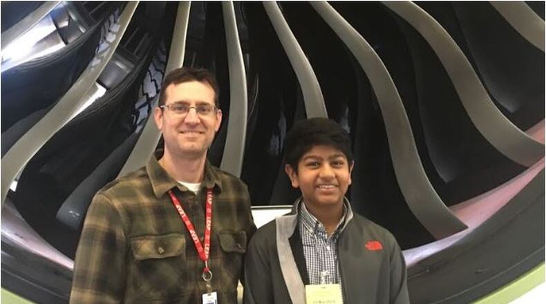 Matthew Marcum of Mentoring Partners of Cincinnati, which was founded in Butler County and he hopes to grow into a regional entity, with Atharva Rao, a student he has mentored, at GE Aviation. PROVIDED