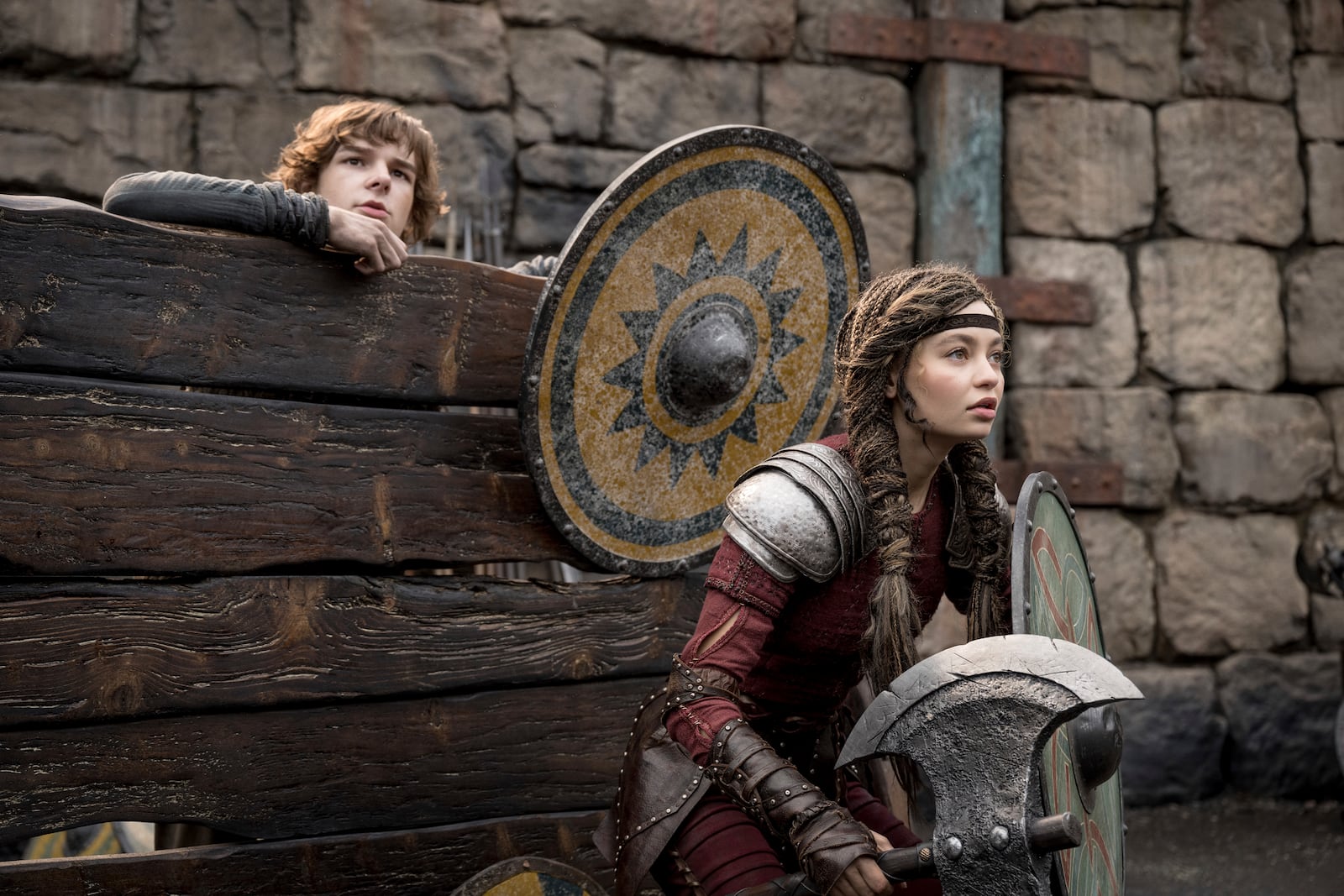 This image released by Universal Pictures shows Mason Thames, left, and Nico Parker in a scene from "How to Train Your Dragon.", (Universal Pictures via AP)