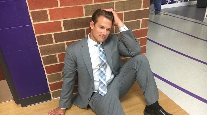 Detective Brandon Highley re-enacts his famous scene from Middletown's lip sync video at the watch party Monday night at Wade Miller Gym at Middletown High School. Highley said he was “tickled to death” the video placed fifth on the CBS show, "Lip Sync to the Rescue."