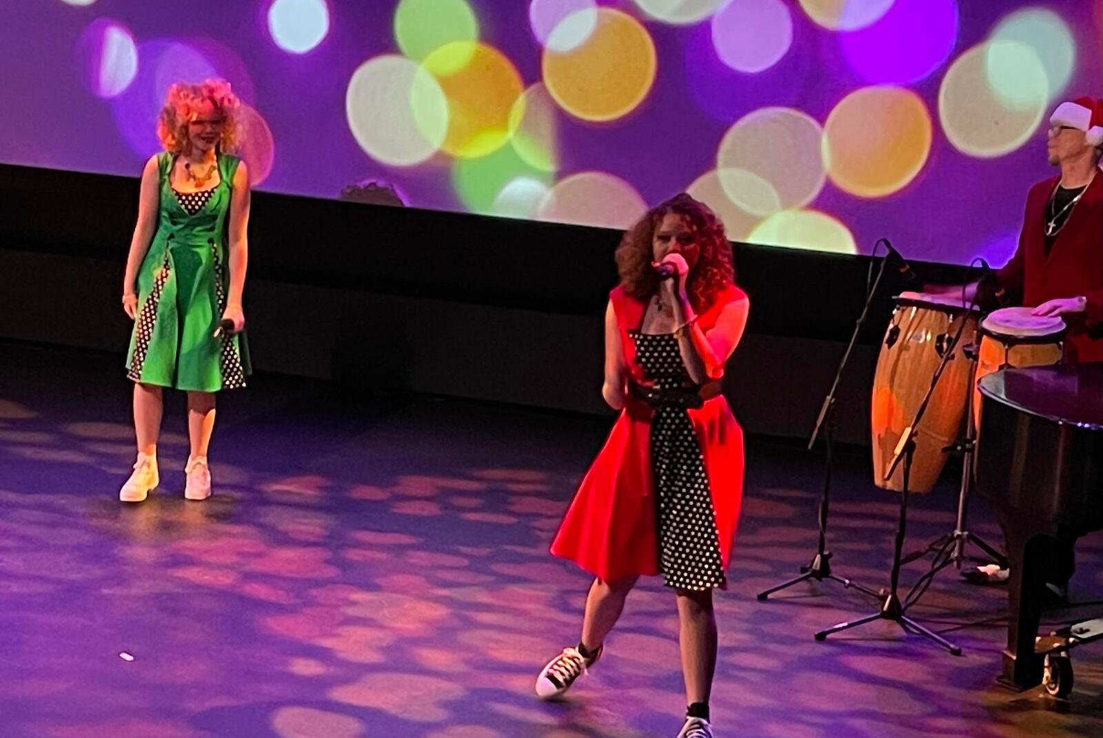 Marie Cunningham, left, and Macie Cunningham, right perform during "Christmas with The Cunninghams" at The Fitton Center in Hamilton on Dec. 19, 2021. The duo was on the latest season of NBC's "The Voice" on Team Kelly.