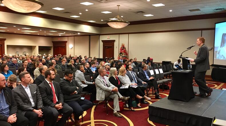 Lakota Schools Superintendent Matt Miller speaks to nearly 300 students and their families at the unveiling of a historic digital learning program starting next school year. The Lakota Cyber Academy will instruct high school students in cyber security skills to enter the much-in-demand employee needs of the booming industry. The informational event was held at the Cincinnati Marriott North in West Chester Township.