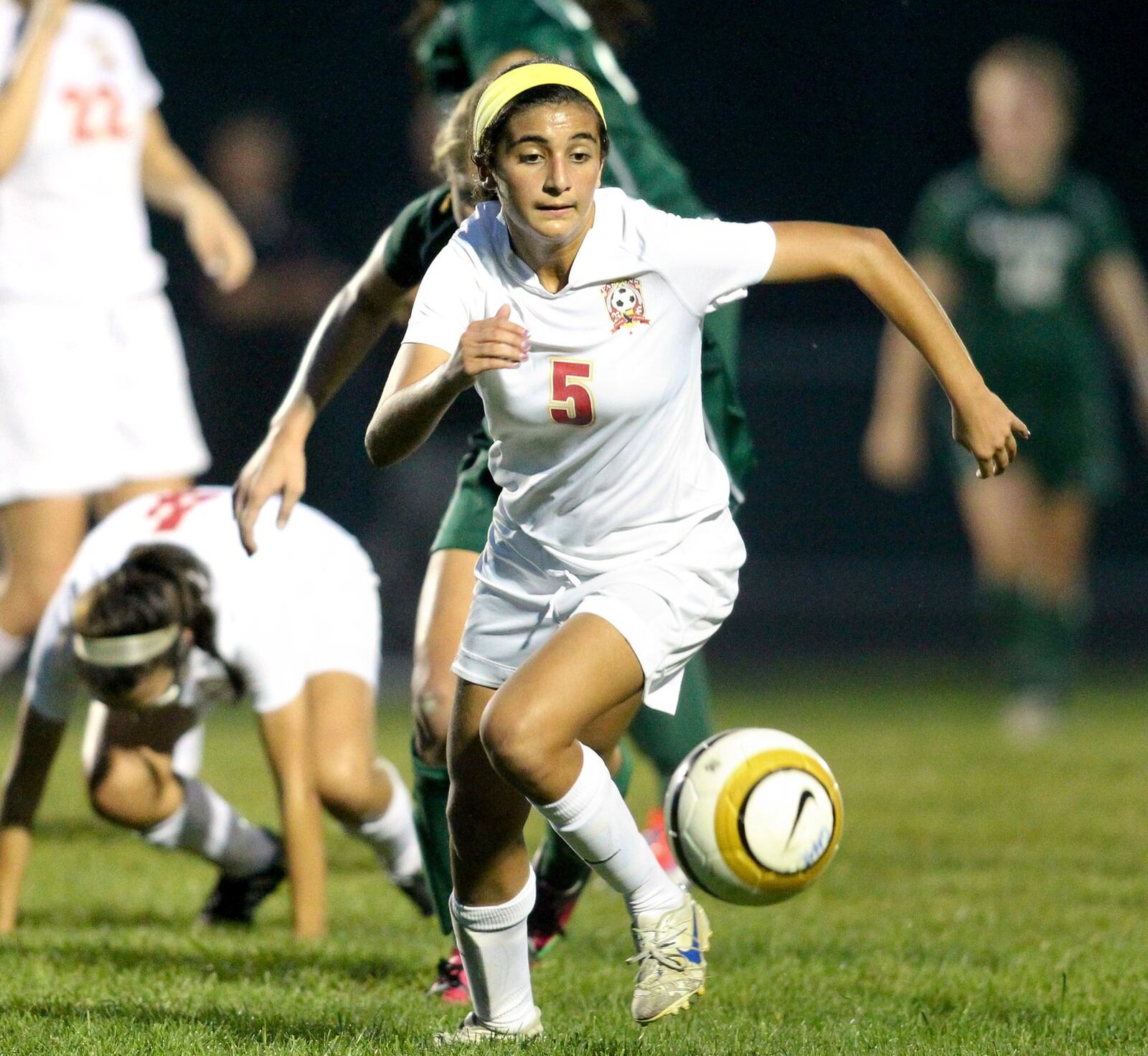Fenwick’s Alisha Himes (5) tracks a loose ball during an Oct. 2, 2013 game against visiting Badin. The contest ended in a 1-1 tie. COX MEDIA FILE PHOTO