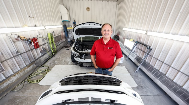 Dean Wright worked in the corporate world for 35 years, and instead of retiring, he bought New Lebanon Body, Frame and Tech. Jim Noelker/Staff
