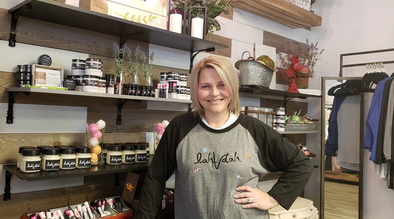 Venita Allen stands inside her boutique, LahVDah, at 408 Main St. in Hamilton. The shop features Allen s homemade artisan soap, body wash, lotion, lip balm, bath bombs, bubble cakes, beauty bars, body butter and face masks, as well as jewelry and clothing. ERIC SCHWARTZBERG/STAFF