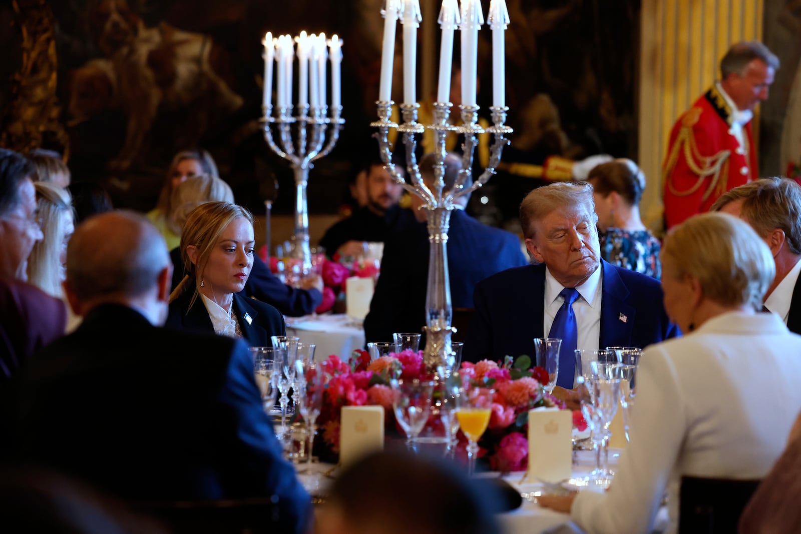 President Donald Trump, center right, and Italy's Prime Minister Giorgia Meloni, center left, attend a dinner for NATO heads of state and government at the Paleis Huis ten Bosch ahead of the NATO summit in The Hague, Netherlands, Tuesday, June 24, 2025. (Remko de Waal, Pool Photo via AP)