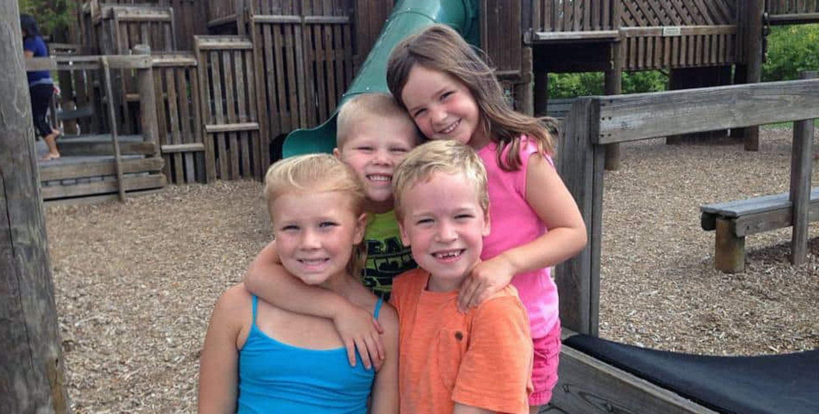 Quinn and Tessa Riegart, of Liberty Twp., are with their friends, Elaina and Will Hulley, of Fairfield, in 2014, at the original Fort Liberty Playland, which their grandfather, Paul Seal, helped construct in a 1999 community build. JENN RIEGART/CONTRIBUTED