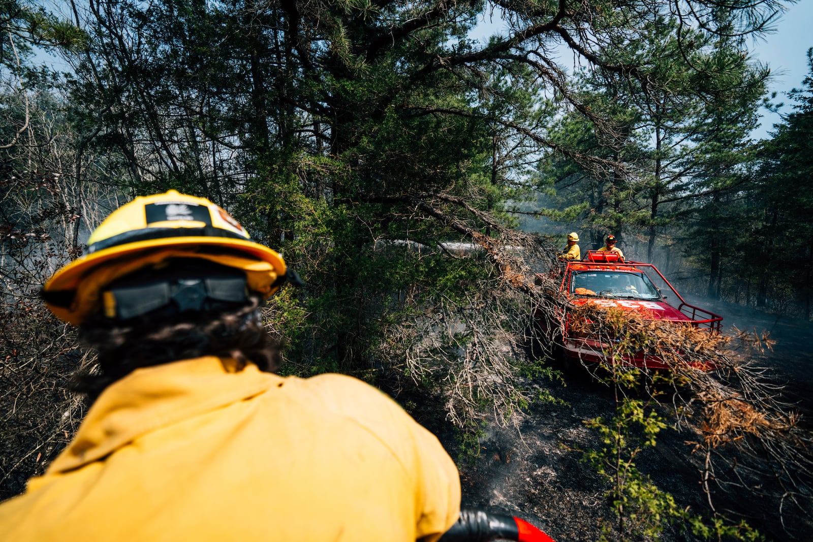 Firefighters battle a wildfire in Ocean County, N.J. on Thursday, April 24, 2025. (New Jersey Department of Environmental Protection via AP)