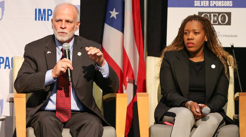 Ohio Sen. Kyle Koehler (R-Springfield) speaks while Rep. Desiree Tims (D-Dayton) listens during a panel in the Ohio Chamber's 2025 Dayton Regional Impact Ohio Conference on Tuesday, Aug. 26, in the Apollo Room in the Student Union at Wright State University. BRYANT BILLING / STAFF