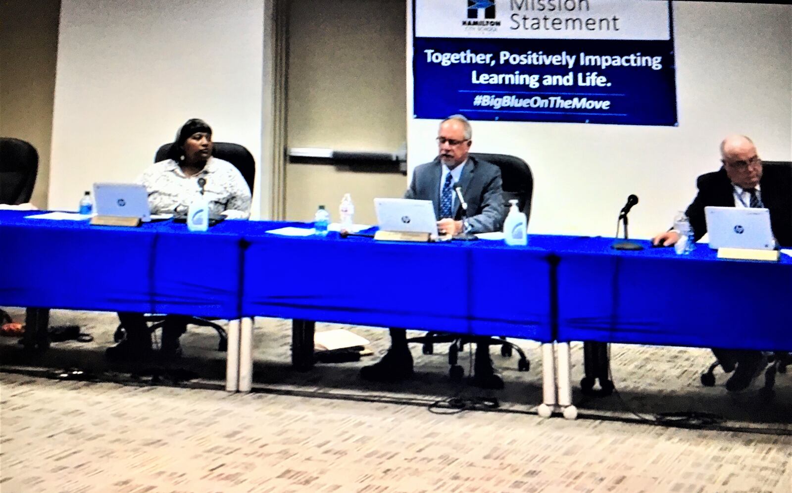 The governing board of the 10,000-student Hamilton Schools announced during its Thursday meeting it "has no interest in mandating Covid-19 vaccination for students or staff." Board President Laurin Sprague (center) did add, however, if ordered by governmental entities outside the district, the schools may have to adopt such a mandate. (Photo By Michael D. Clark\Journal-News)