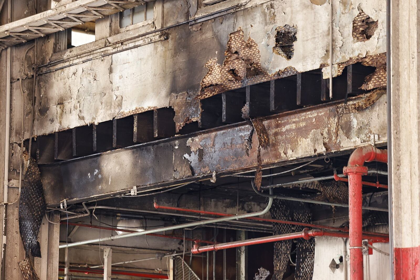 Some damage is visible from the road after firefighters battled a fire Sunday, Feb. 6, 2022 at the former Beckett Paper Company in Hamilton. NICK GRAHAM/STAFF