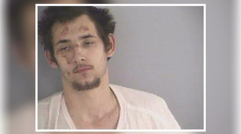 Dallas Hall is charged with burglary, obstructing official business and underage intoxication.
