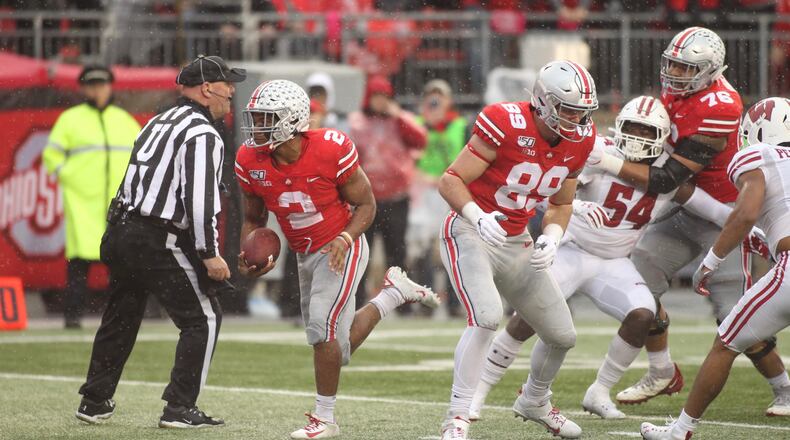 Ohio State’s J.K. Dobbins runs for a touchdown against Wisconsin on Saturday, Oct. 26, 2019, at Ohio Stadium in Columbus. David Jablonski/Staff