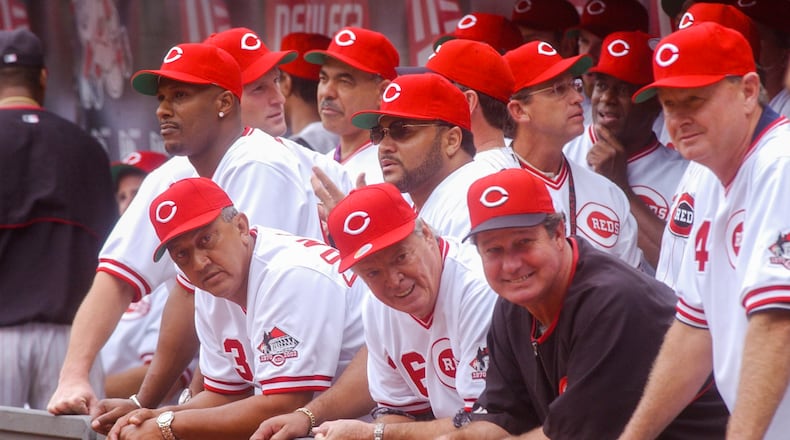 Former Reds players including Eric Davis, Dave Concepcion, Don Gullett, and Jack Billingham and others, wait in the Reds dugout prior to post-game festivities following the final game at Cinergy Field in Cincinnati on Sept. 22, 2002. Greg Lynch/STAFF FILE PHOTO