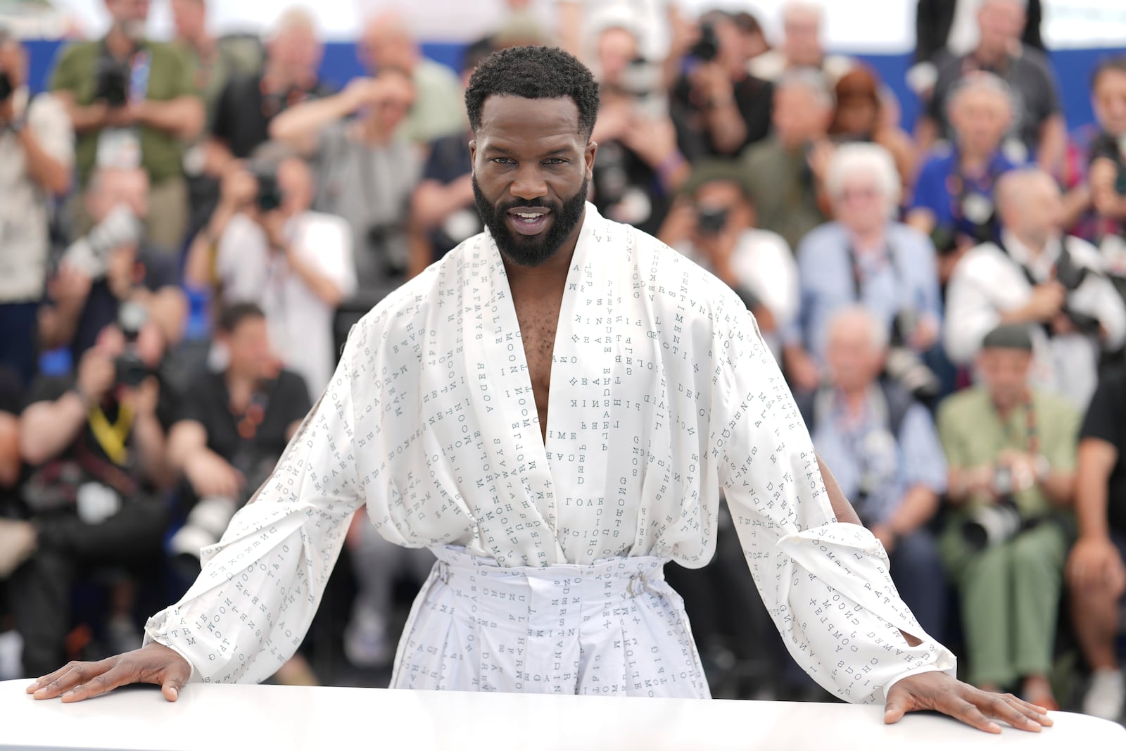 Sope Dirisu poses for photographers at the photo call for the film 'My Father's Shadow' at the 78th international film festival, Cannes, southern France, Sunday, May 18, 2025. (AP Photo/Natacha Pisarenko)