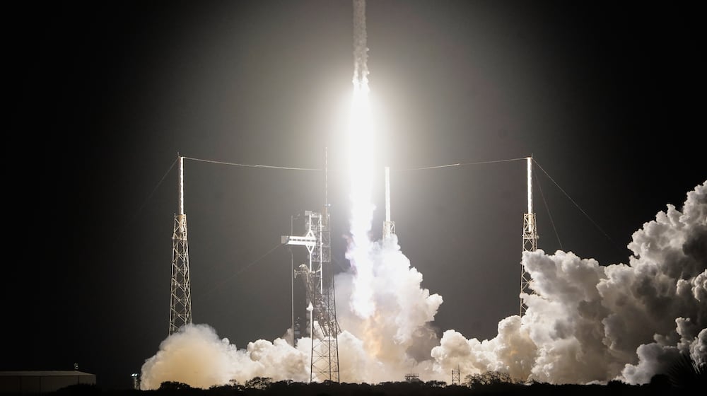 A SpaceX Falcon 9 rocket with a crew of four aboard the Dragon space craft lifts off from pad 40 at the Cape Canaveral Space Force Station in Cape Canaveral, Fla., Friday, Feb. 13, 2026. (AP Photo/John Raoux)