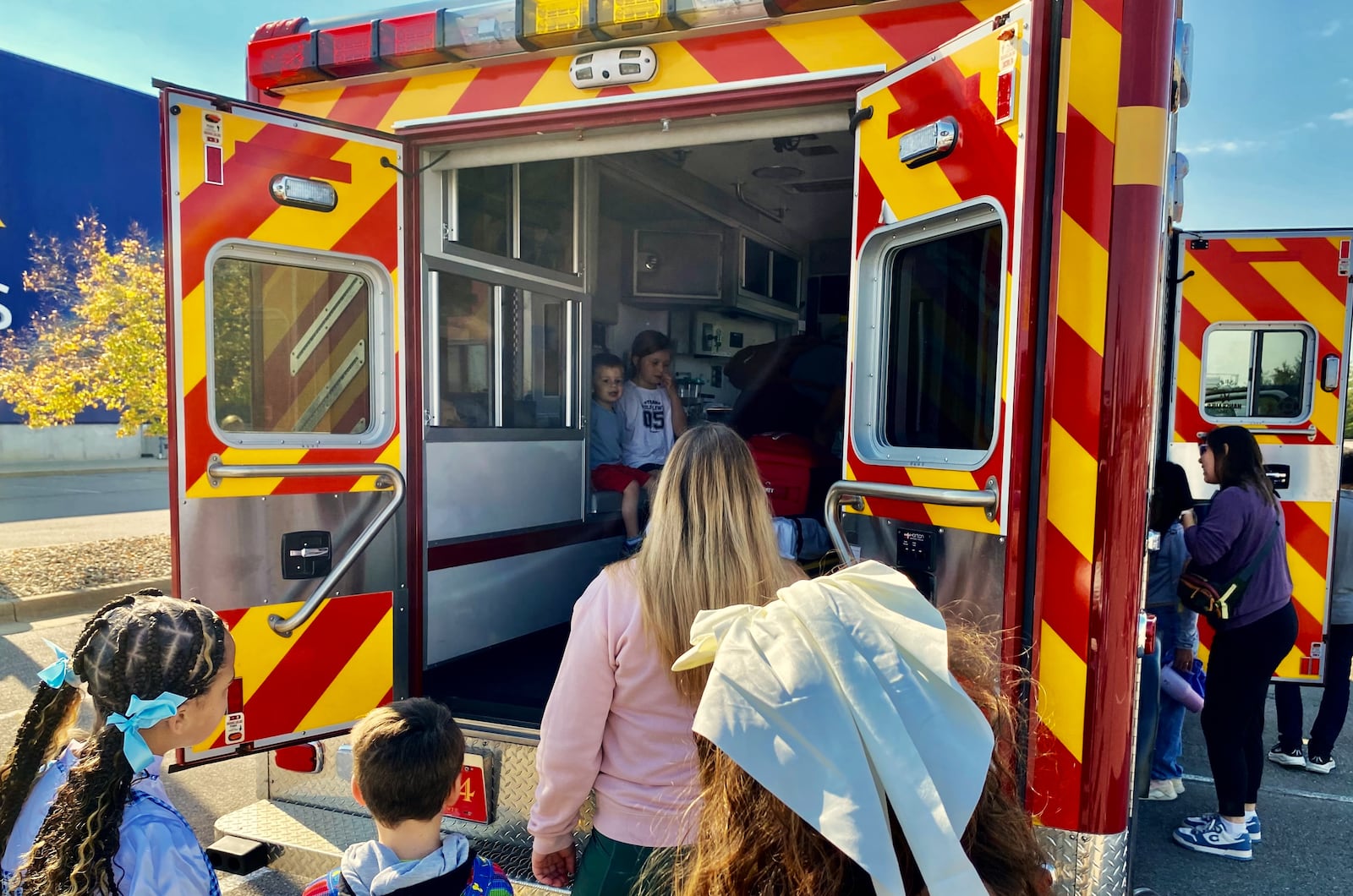 West Chester Twp.'s recent Touch-A-Truck event drew hundreds. Young children clamored around and through West Chester Fire, Police, EMS, Haz Mat and SWAT vehicles, as well as Butler County emergency services vehicles and farm tractors, all parked outside the Ikea store near the Interstate 75 and Union Centre Blvd interchange. (Photo By Michael D. Clark/Journal-News)